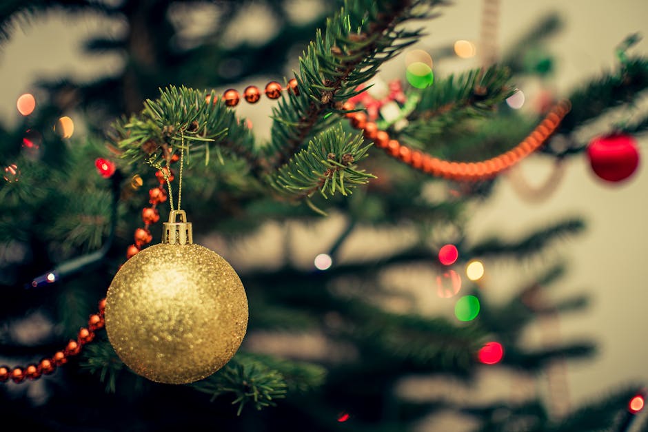Yellow Bauble on Christmas Tree