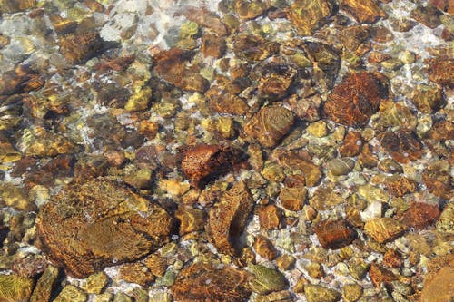 Free Stones Under Clear Water Stock Photo
