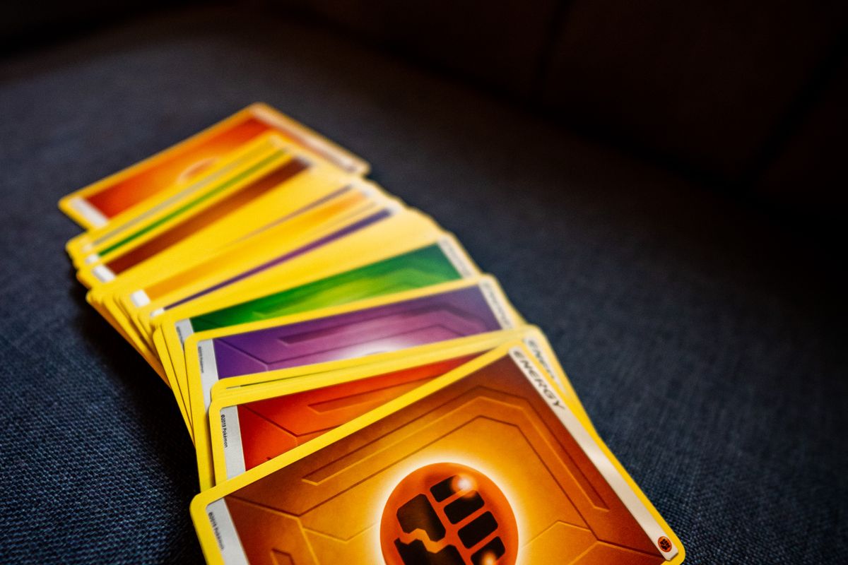 Pile of Pokémon energy cards used to build a deck