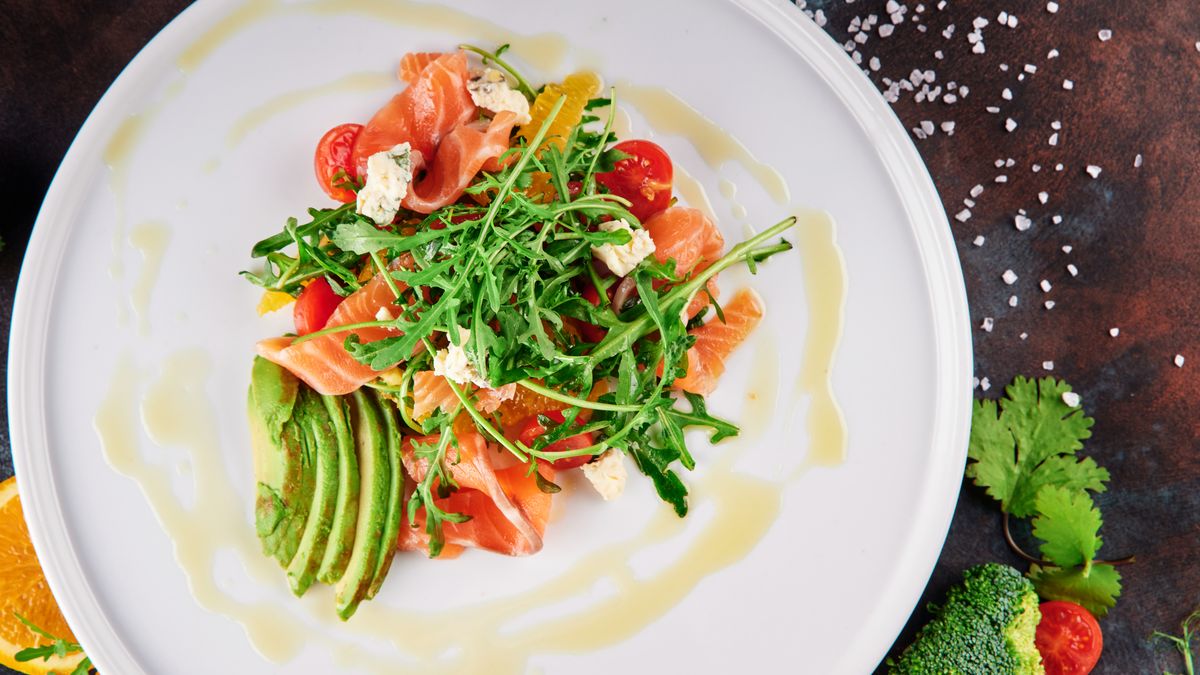 Baked fresh salmon with cherry tomatoes and coriander