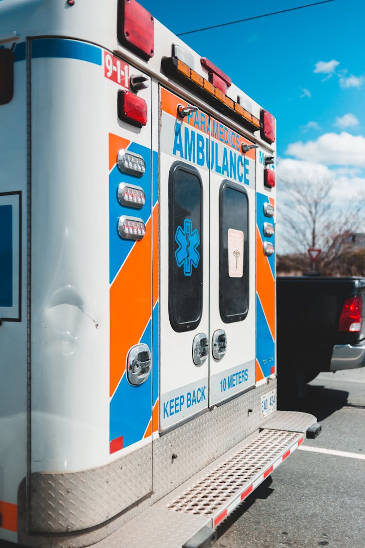 Ambulance Car Riding On Road