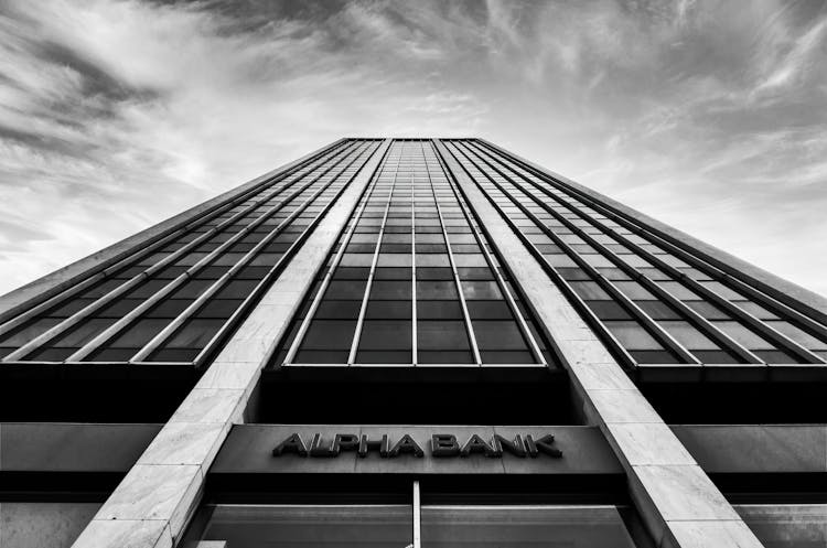 Monochrome Photograph Of The Facade Of A Bank 