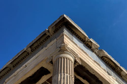 Low-Angle Shot of a Building with Pillar