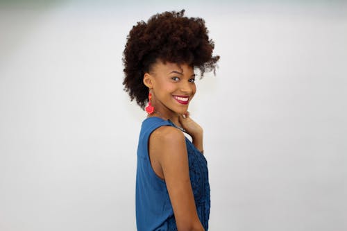 A Woman Wearing a Blue Tank Top