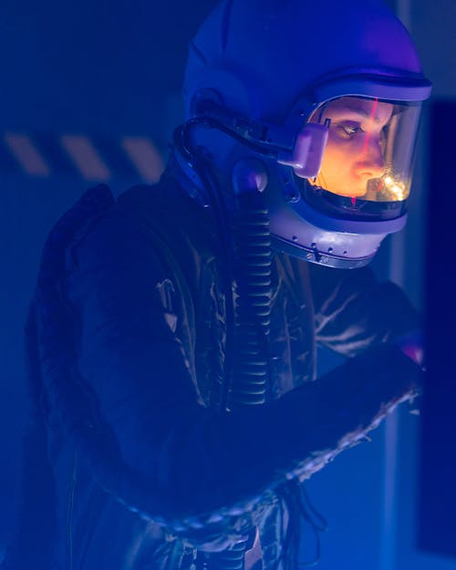 Woman In Blue Space Suit