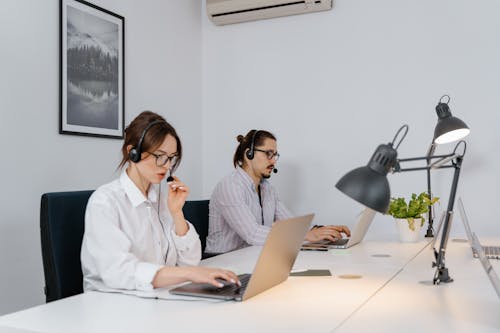 Free Call Center Agents Working Stock Photo