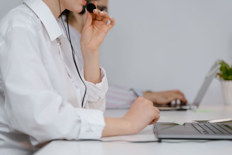 IT support technician providing hands-on helpdesk assistance