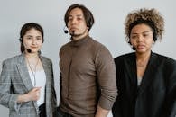 Group of People Wearing Black Headphones