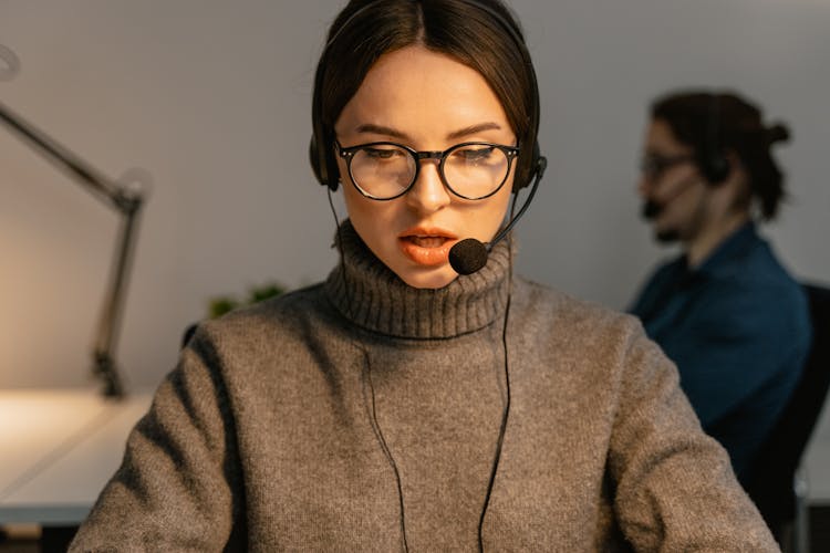 A Woman Working In A Call Center