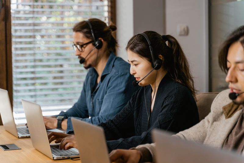 Friendly customer support team working together