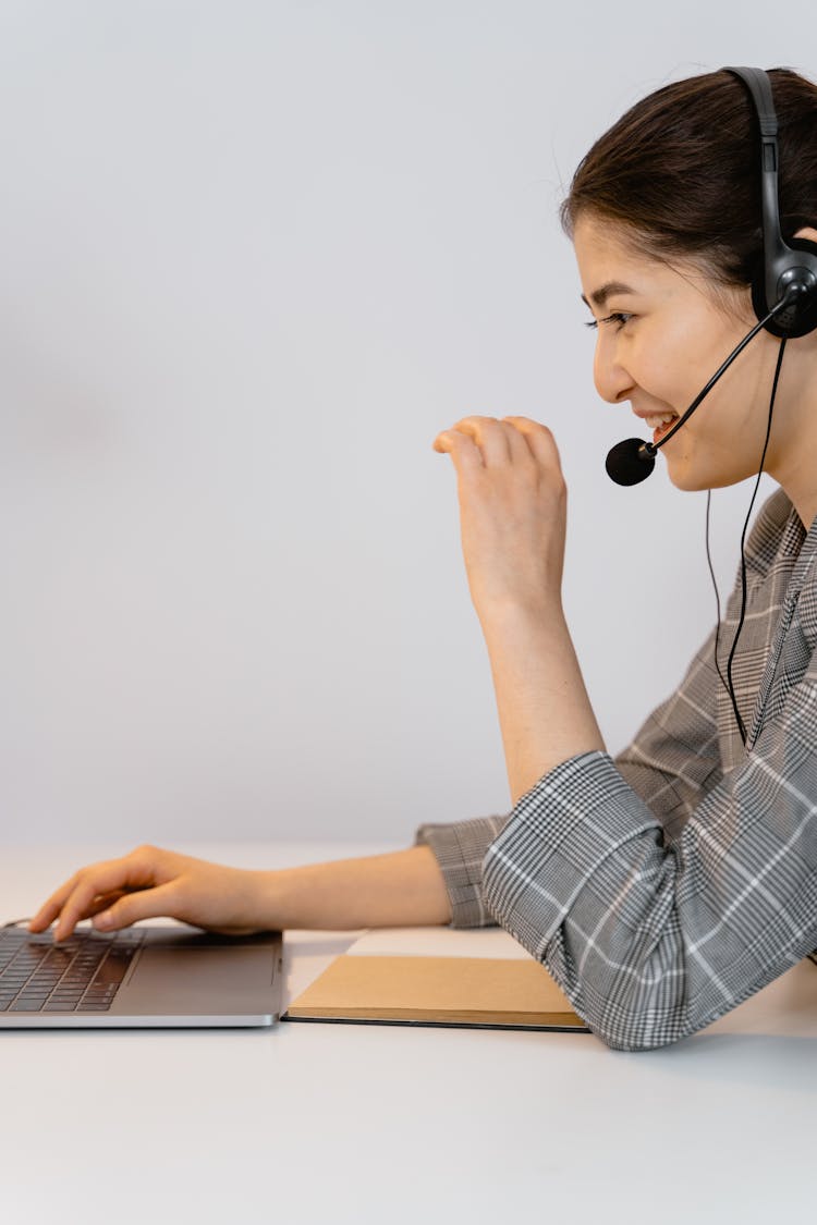 Woman With Black Headset And Mouthpiece