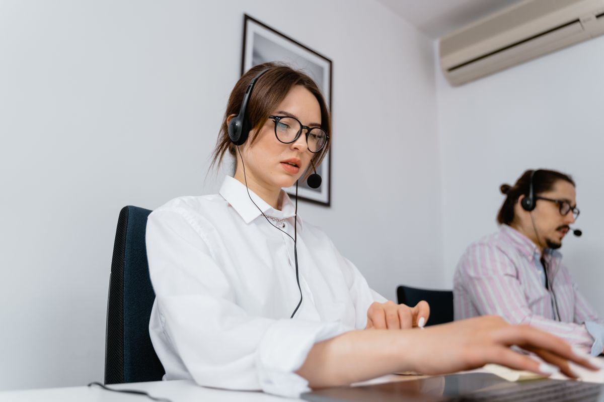 Inside sales executive speaking with customer
