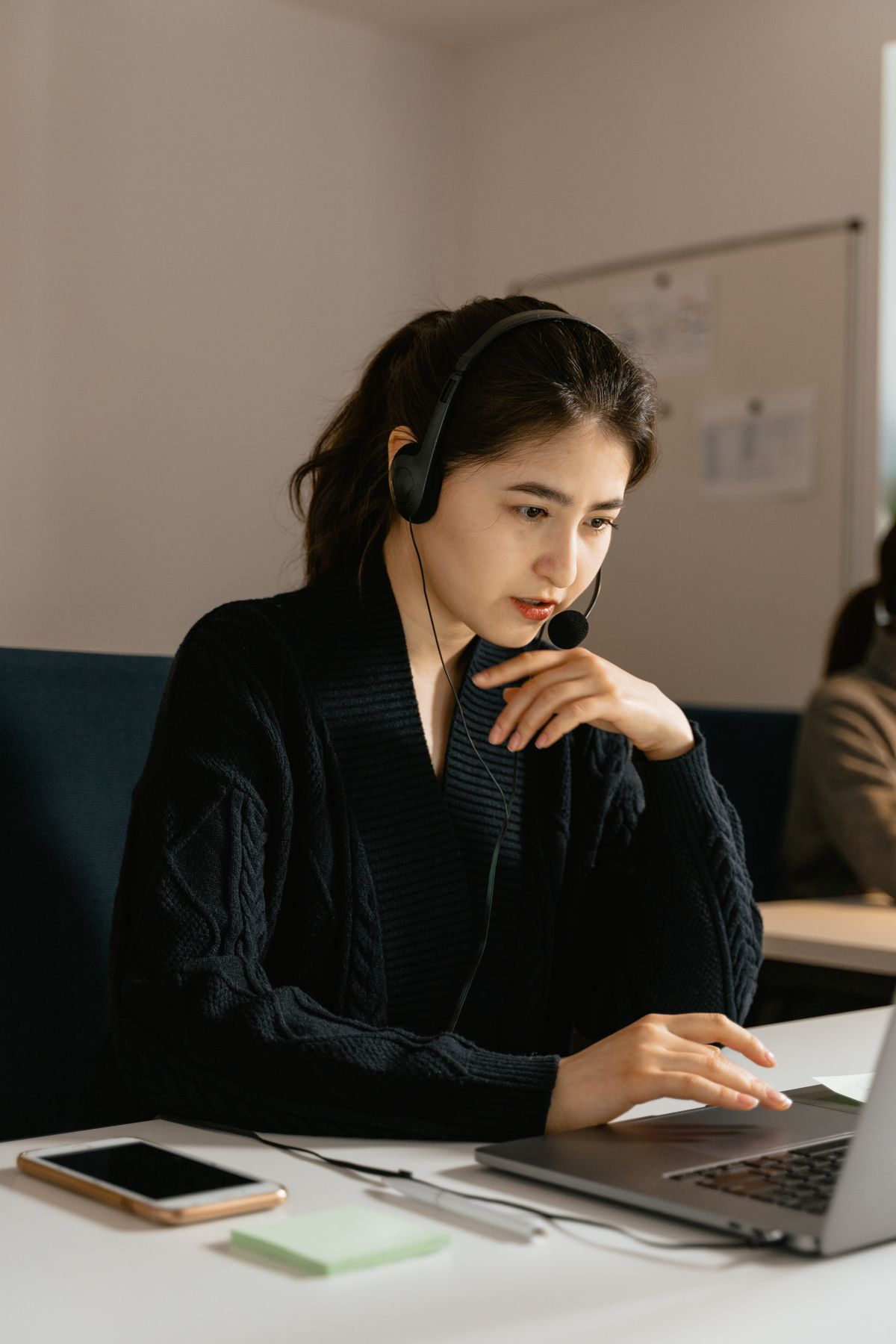 Customer support professional with headset