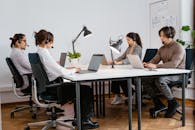 People Working in Call Center