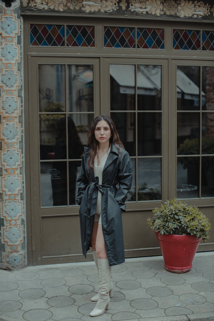 Woman Posing In Coat And Boots