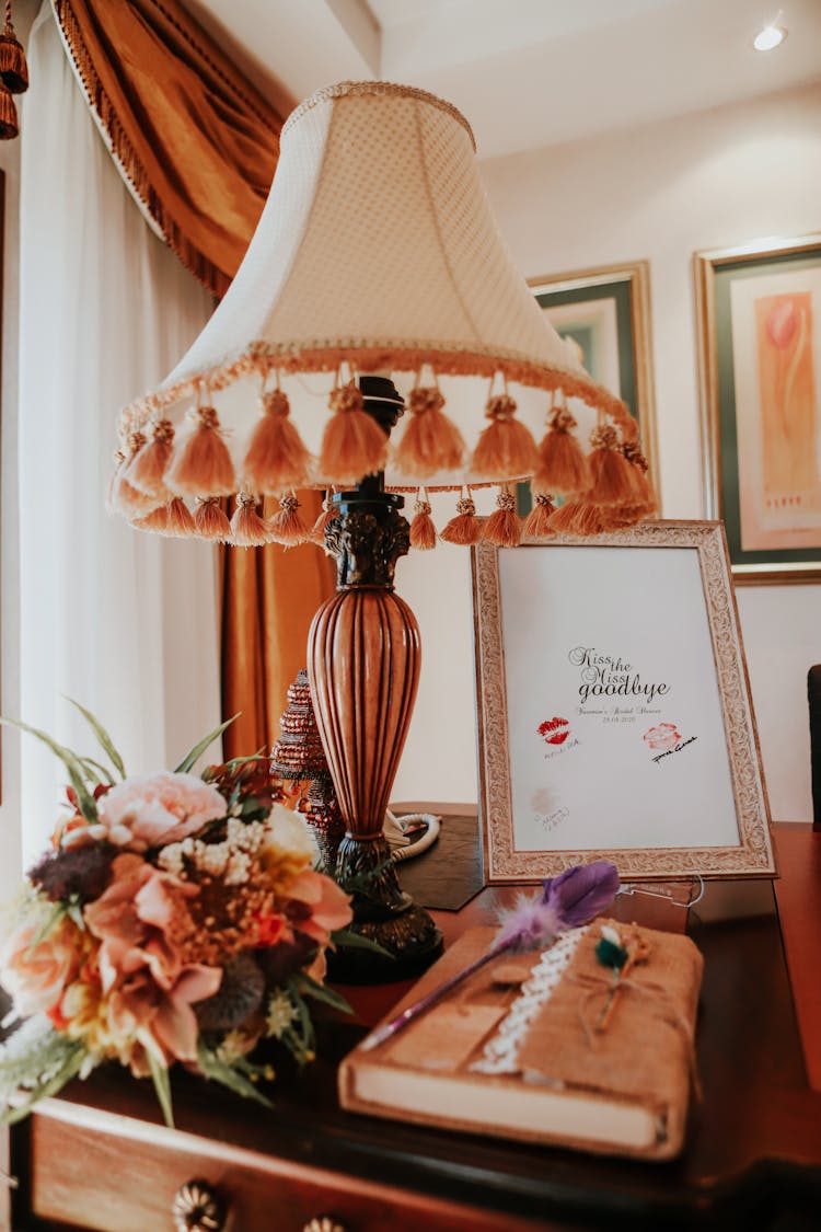 Vintage Lamp And Elegant Bridal Bouquet Placed On Table Before Wedding Ceremony