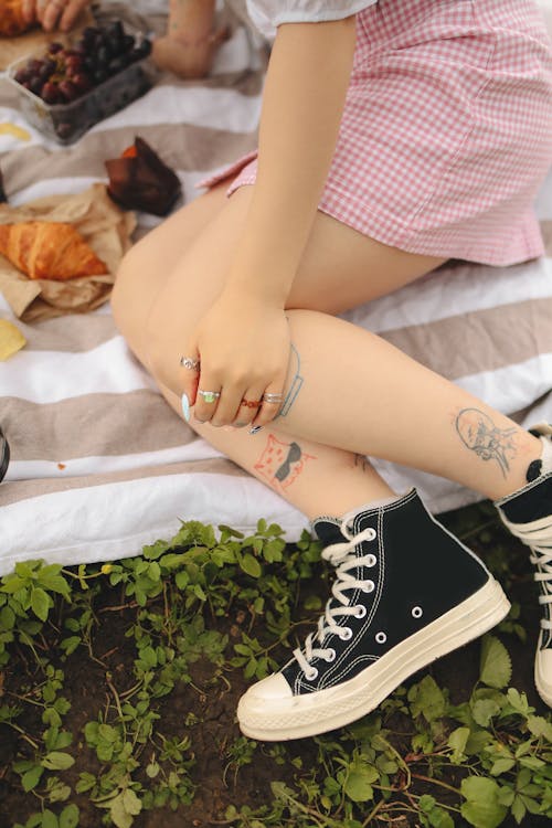 Free  Tattoos on a Woman's Legs Stock Photo