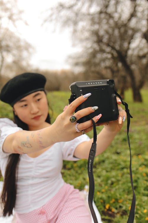 Woman Taking a Photo of Herself 