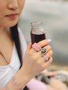 Woman in White Tank Top Holding Clear Drinking Glass