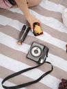 Gray and Black Point and Shoot Camera