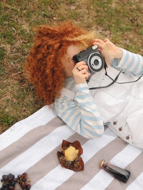 Woman Holding a Camera