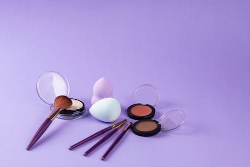 Free Makeup Tools on Purple Surface Stock Photo