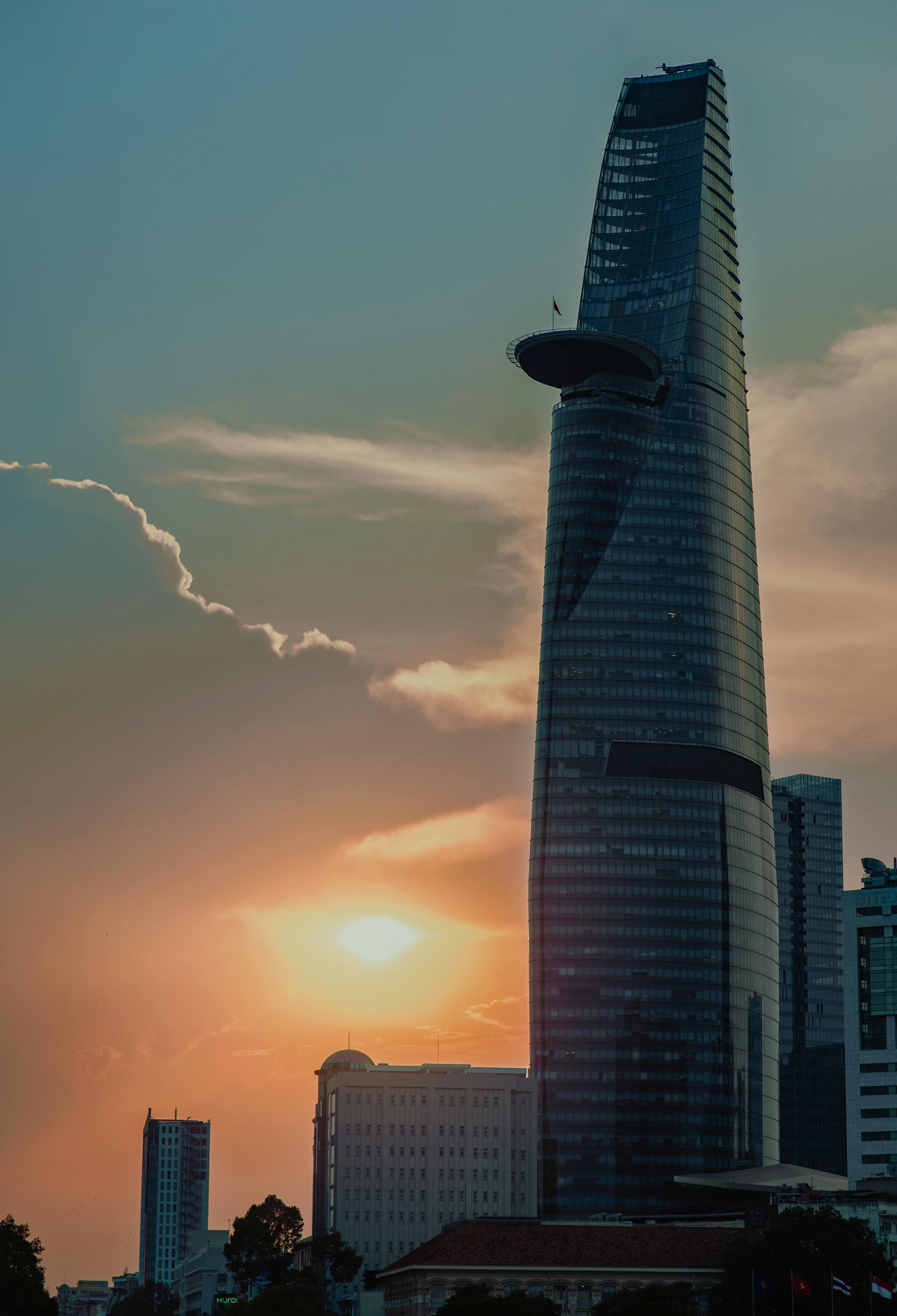 curtain wall high rise building during sunset