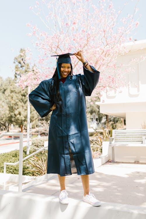 Woman in Black Academic Dress · Free Stock Photo