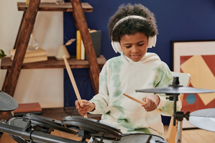 Cute Kid Playing Drums