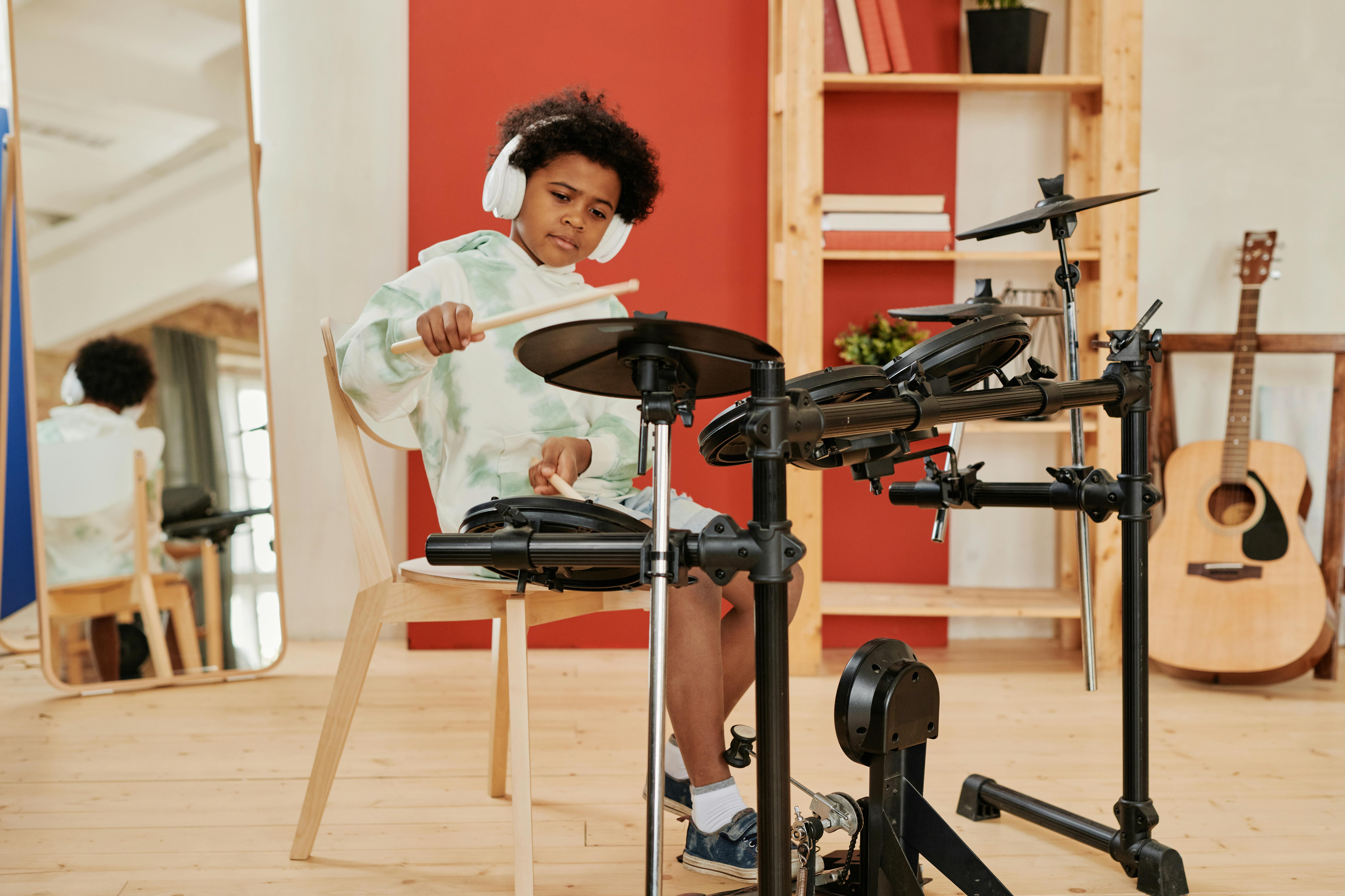 Free A Boy Playing Electric Drums Stock Photo