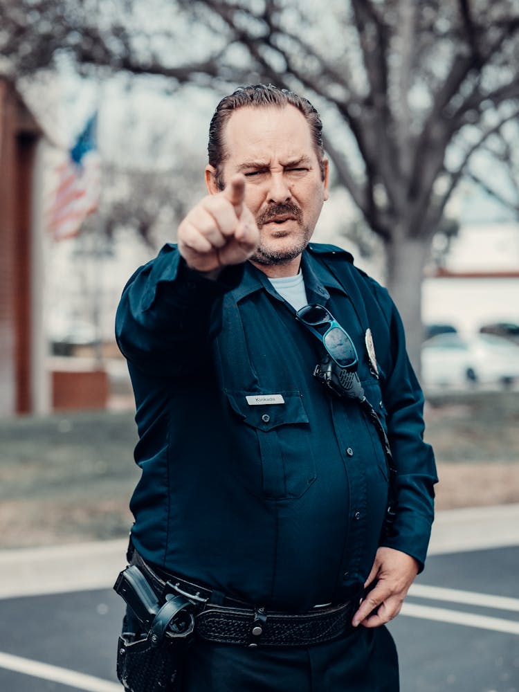 A Man In Police Uniform