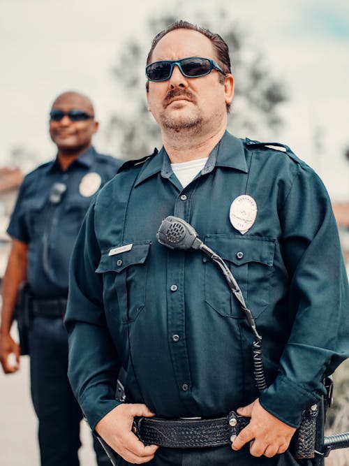 Kostenloses Stock Foto zu cops, männer, offiziere