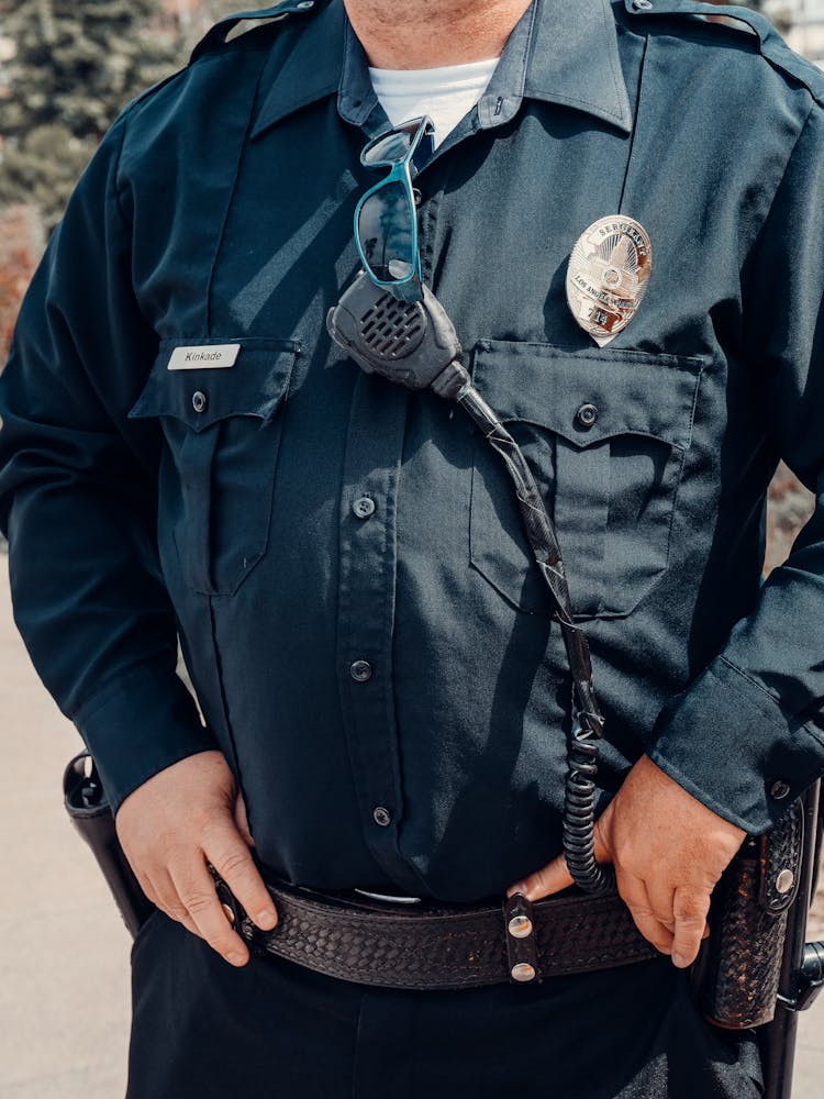 Close-Up Shot Of A Police Officer