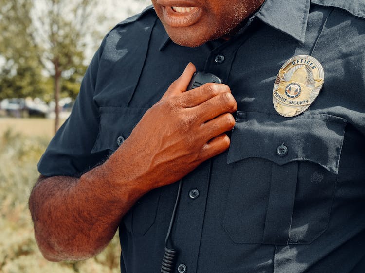 Close-Up Shot Of A Police Officer