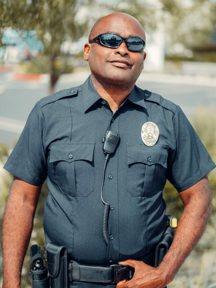 A Police Officer In His Uniform