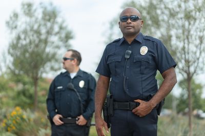 Uniformed officers on patrol, photo by Kindel Media on Pexels