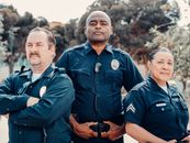 Three Police Officers in Blue Uniform