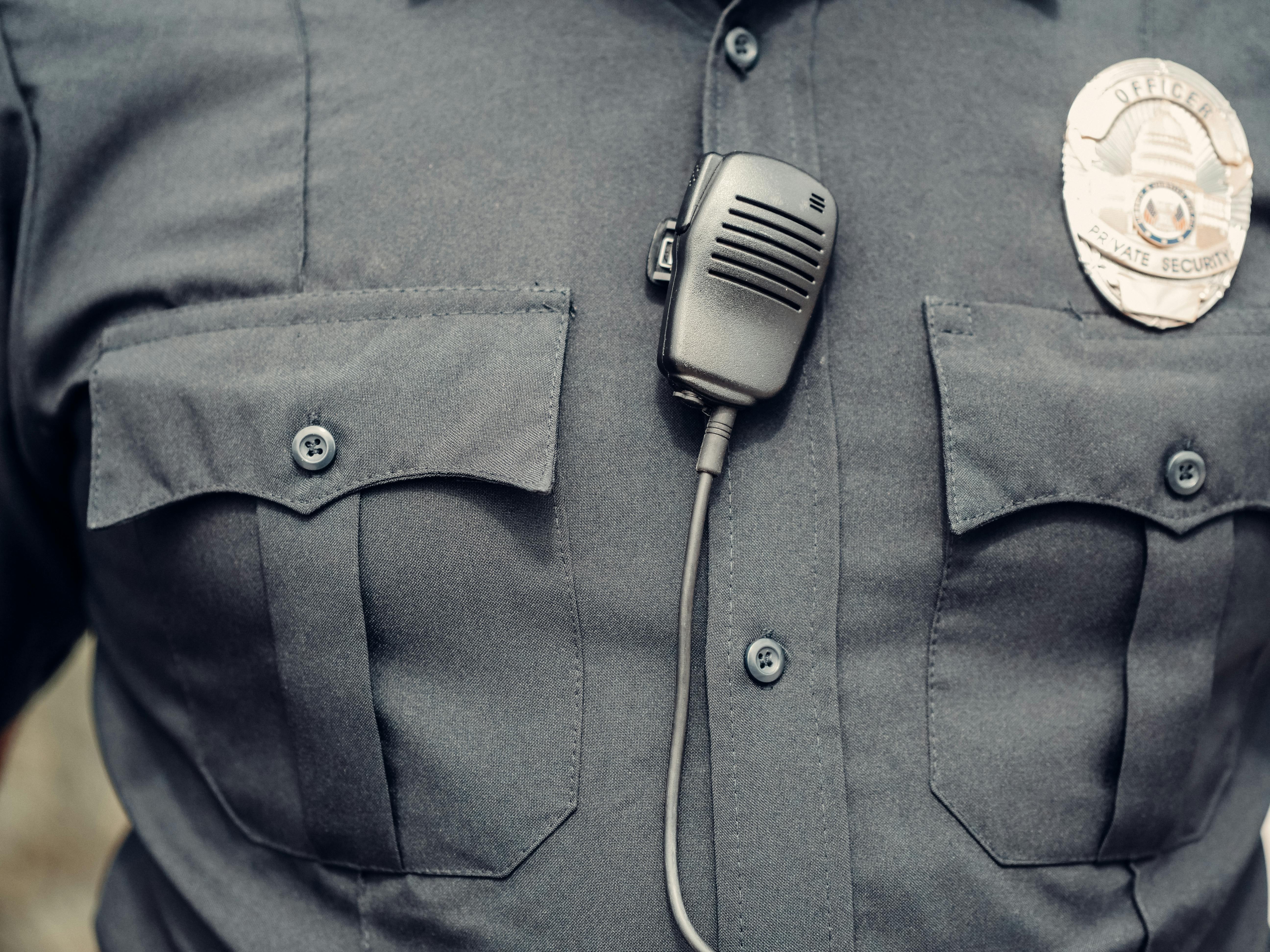 person in police uniform with body cam