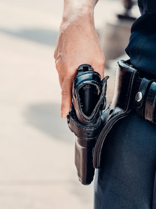 Free Person Holding a Handgun Stock Photo
