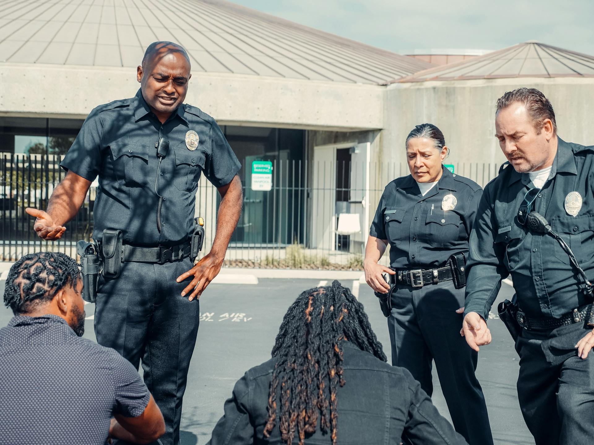 Two Police Officers Talking to a Men