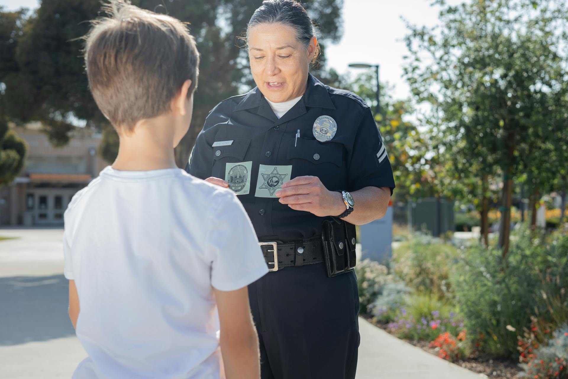 Policewoman Talking to a Kid