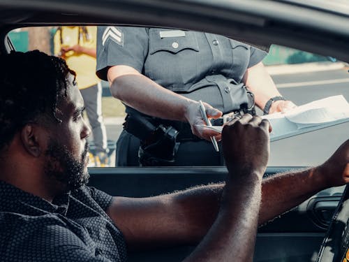 Безкоштовне стокове фото на тему «афро коси, афроамериканський чоловік, дорожній патруль»