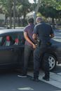 A Police Arresting a Man