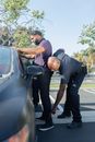 A Police Arresting a Man