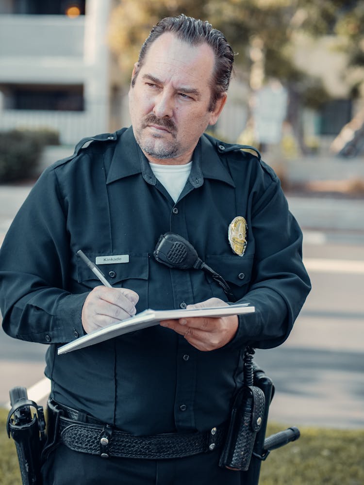 Selective Focus Of A Community Police Officer