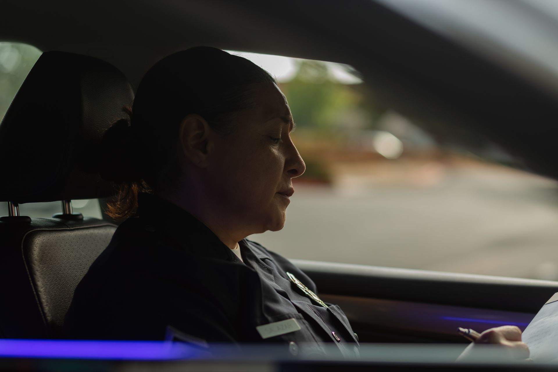 Shallow Focus of a Police Officer inside the Car