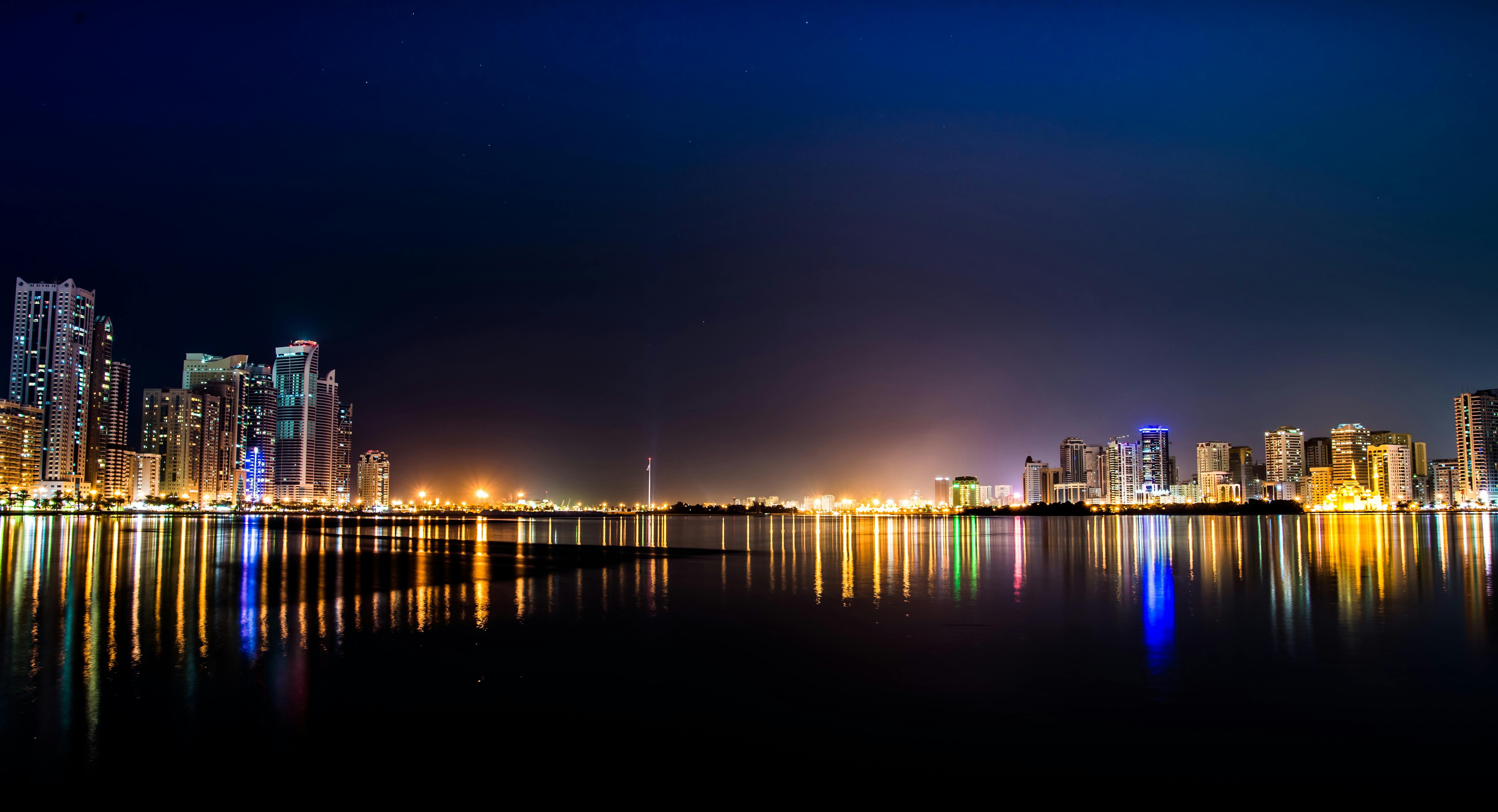 High Rise Buildings Across Body of Water · Free Stock Photo : A astonishing image depicting a stunning view. Its tones are just vibrant and blend flawlessly. Its composition looks wonderful, with its features are also extremely defined.