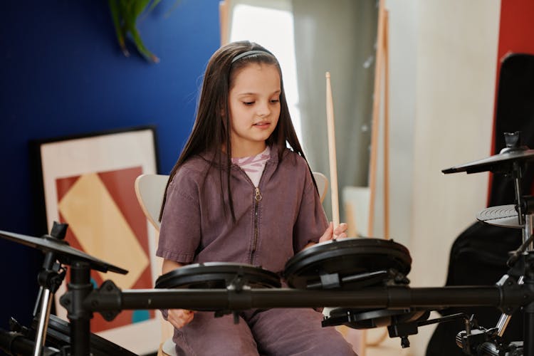 Girl Playing Electronic Drums