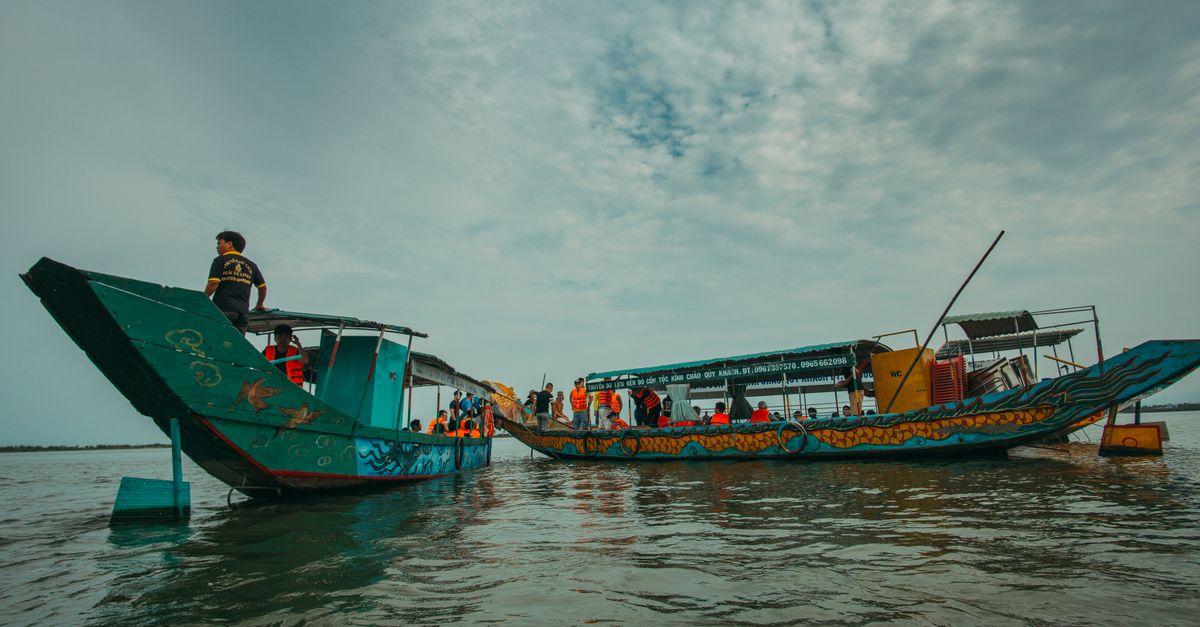 People Riding Ship People Riding Boats on Water · Free Stock Photo