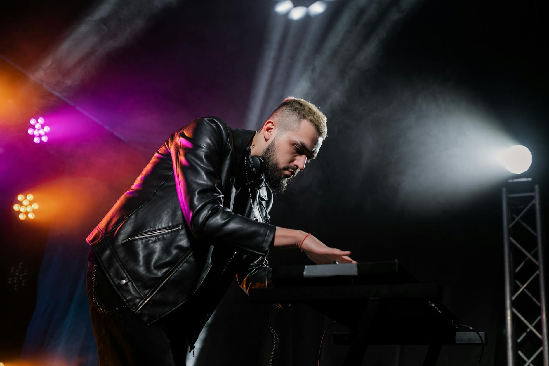Man in Black Leather Jacket Playing Piano · Free Stock Photo